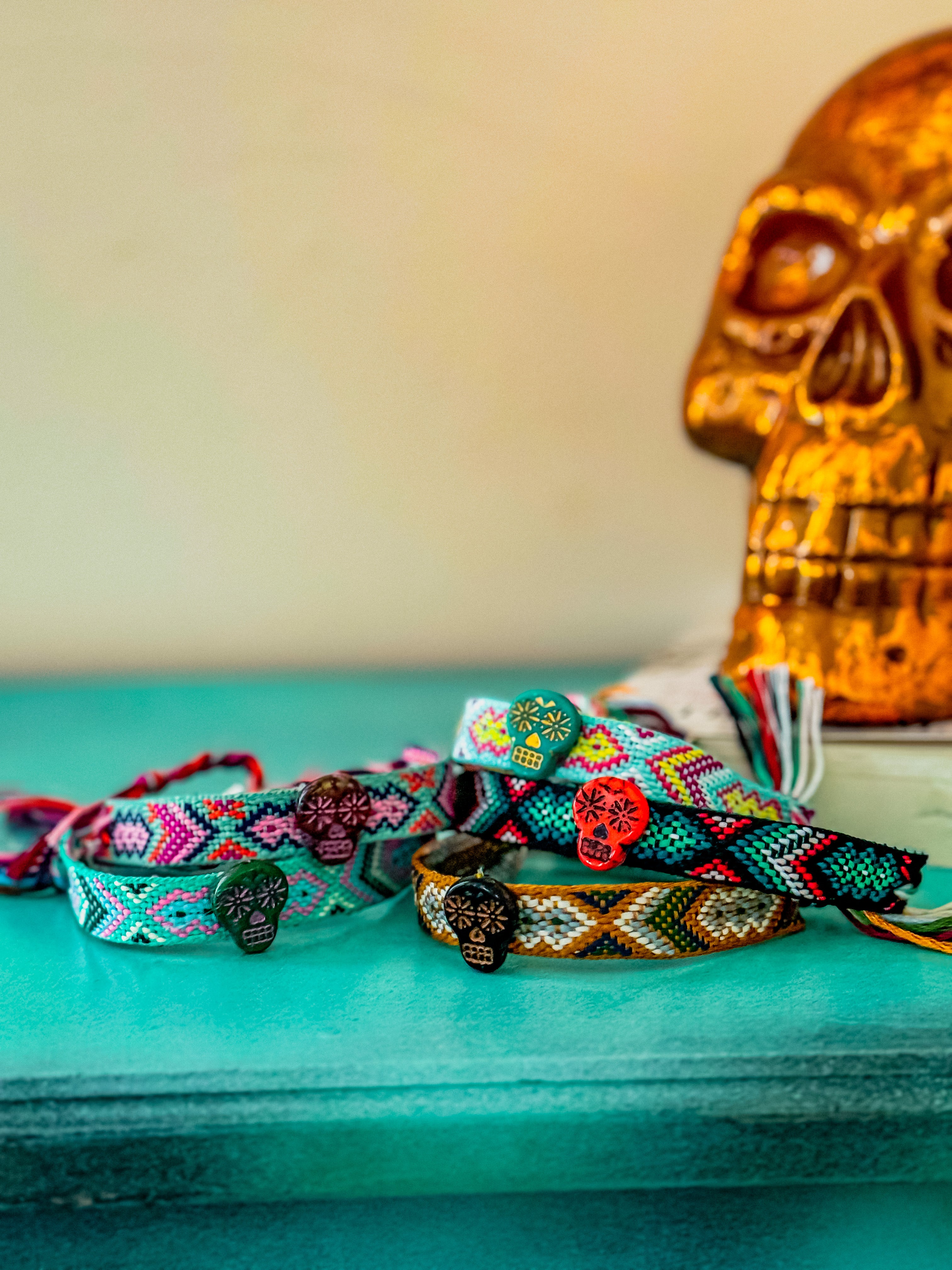 Woven friendship bracelets handmade of thread on males wrist Stock Photo -  Alamy